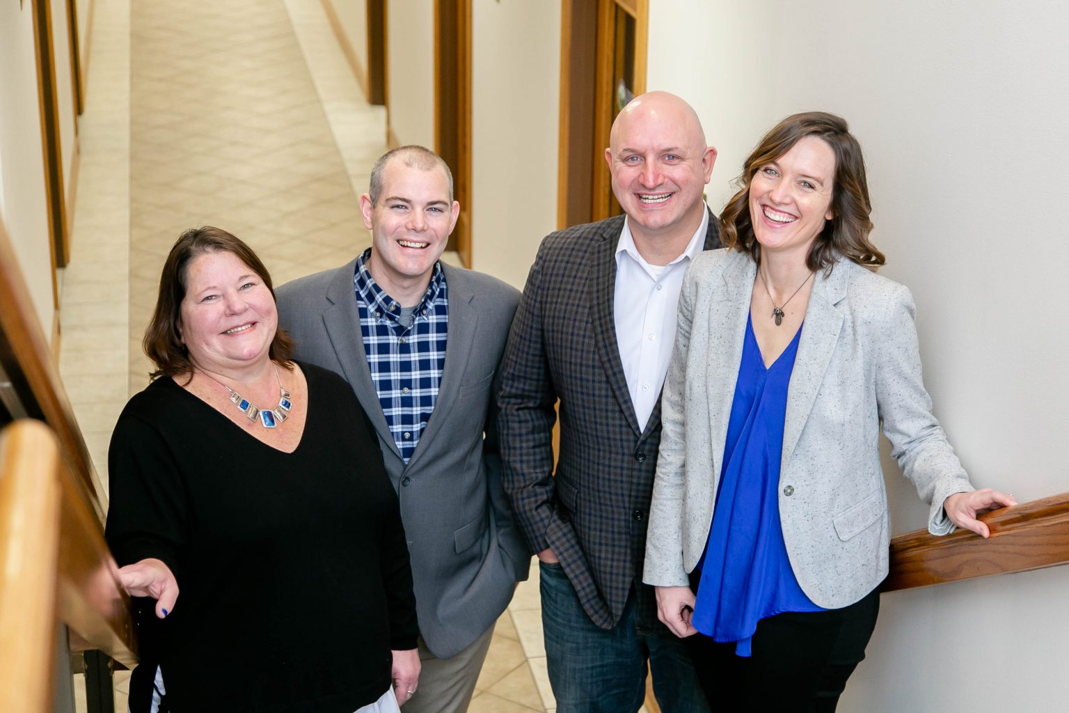 Team laughing stairs